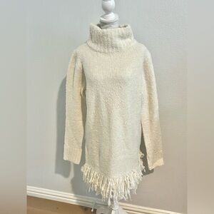 Vici Cream Turtleneck Sweater with Fringe